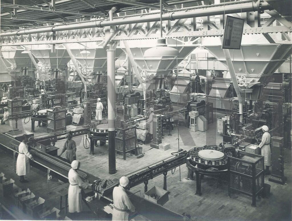 Image of 1930s soap production factory line. 