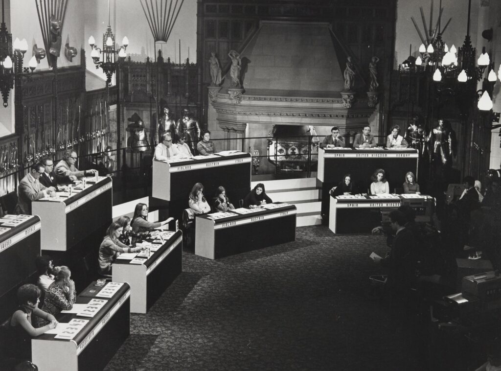 Black and white image of judges at the Eurovision Song Contest at Edinburgh Castle, 1972