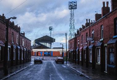 A view looking along Second Avenue towards Springfield Park, home of Wigan Athletic Football Club. December 1994. 