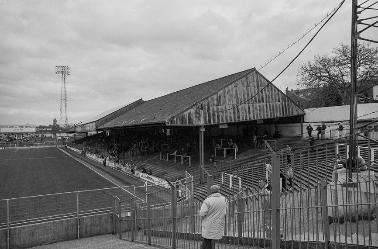 A view from the Tilehurst End towards the Popular Side at Elm Park, home of Reading Football Club. 1990. 